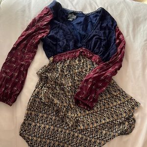 Flowy 70’s inspired high low top blouse.